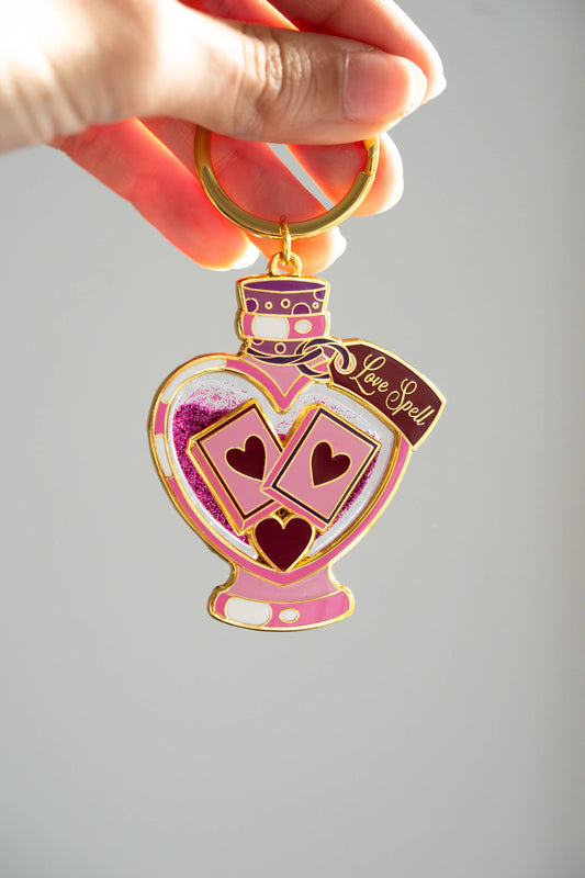 Book Love Spell Potion Liquid Glitter Enamel Keychain