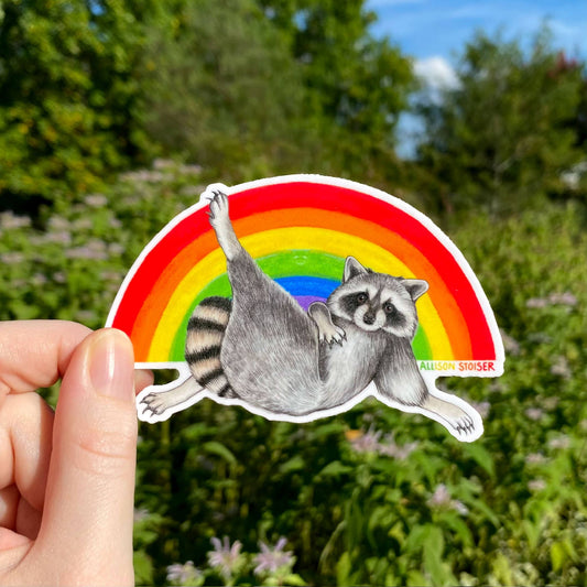 Rainbow Lounging Raccoon Pride Weatherproof Vinyl Sticker